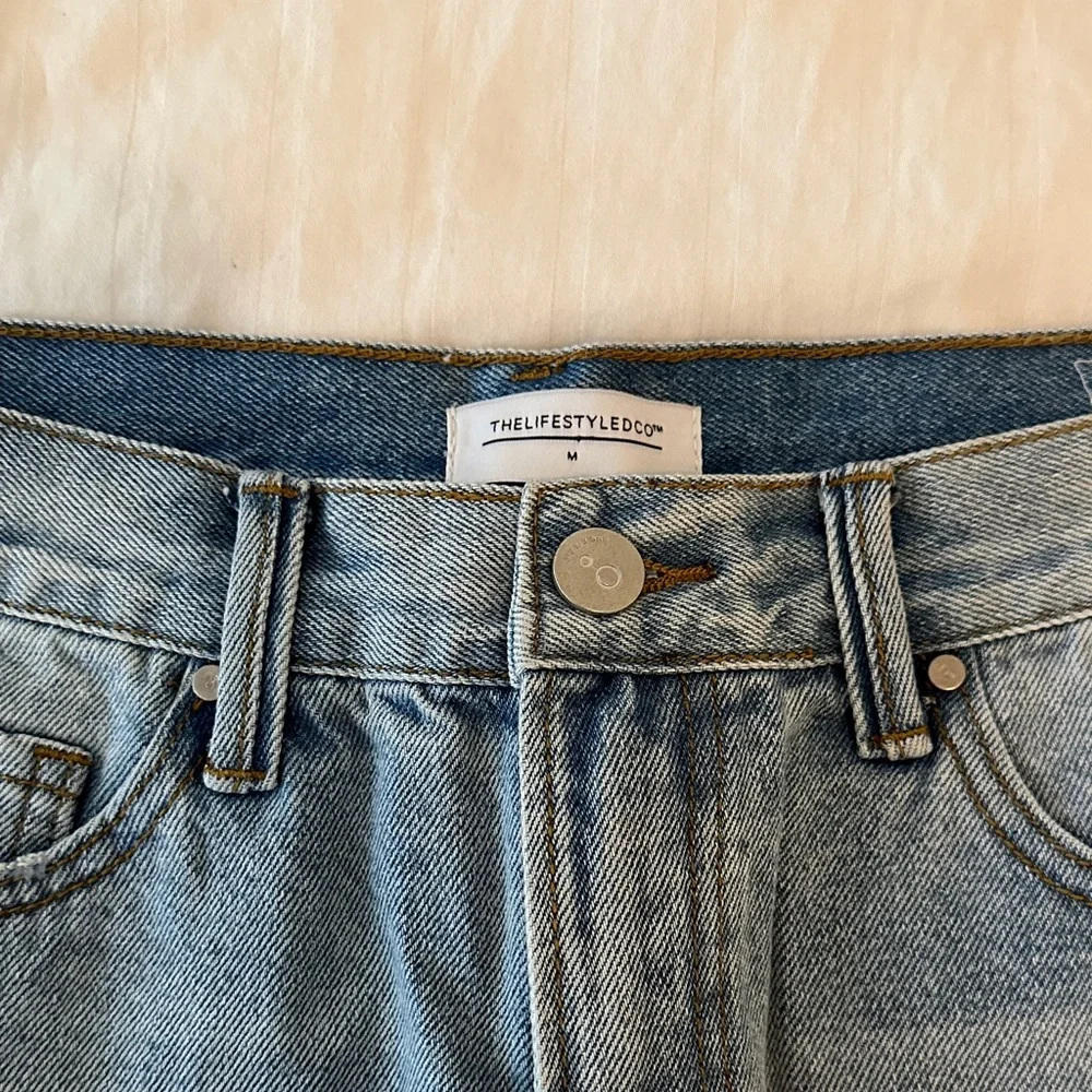 WOMEN'S DISTRESSED DENIM BLUE MINI SKIRT M